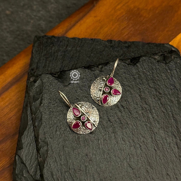 92.5 Sterling Silver earrings with maroon coloured stones.
light weight and easy to wear