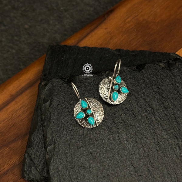 92.5 Sterling Silver Earrings with Turquoise coloured stones.
Light weight and easy to wear