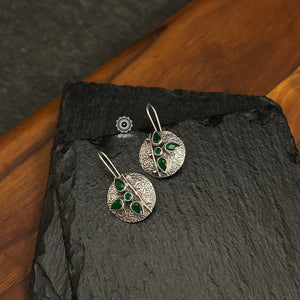 92.5 Sterling Silver earrings with Green coloured stones.
light weight and easy to wear