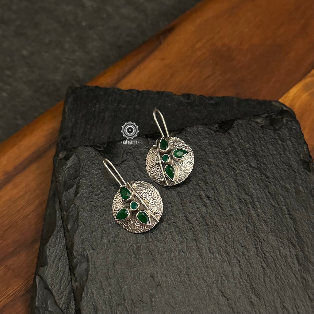 92.5 Sterling Silver earrings with Green coloured stones.
light weight and easy to wear