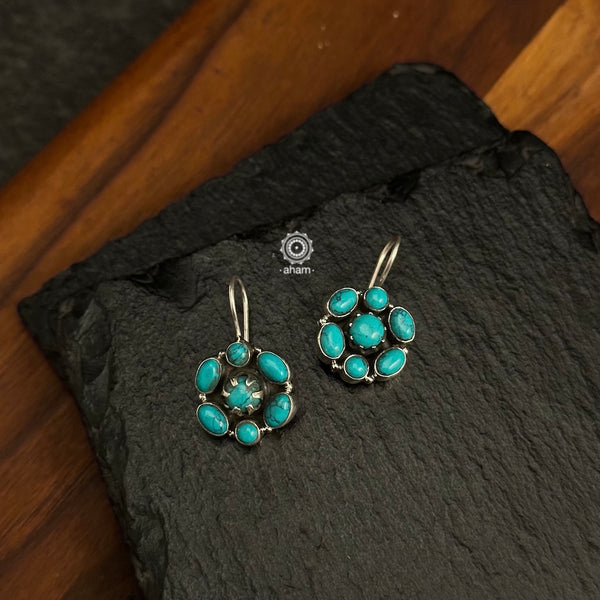 92.5 Sterling Silver Earrings with Turquoise coloured stones.
light weight and easy to wear.