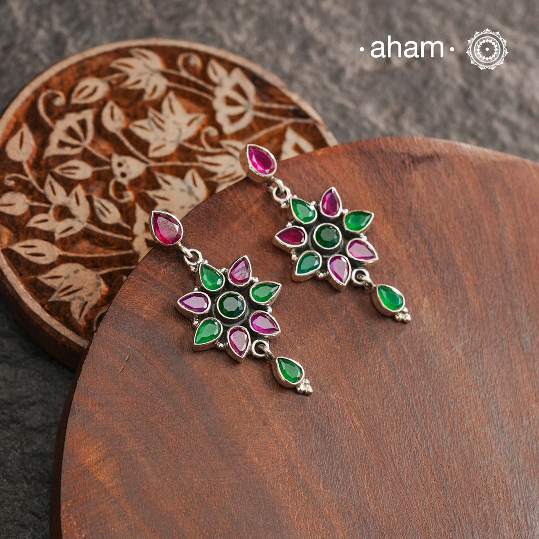 92.5 Sterling Silver Earrings with Maroon & Green stones. Light weight and easy to wear all day long. The colours are something you can wear with most Indian Outfits. 