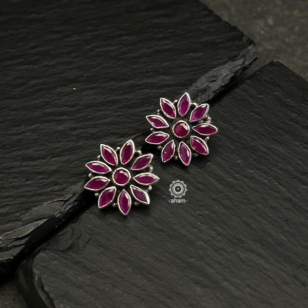 92.5 sterling silver studs with Maroon stones. Light weight and easy to wear all day long. 