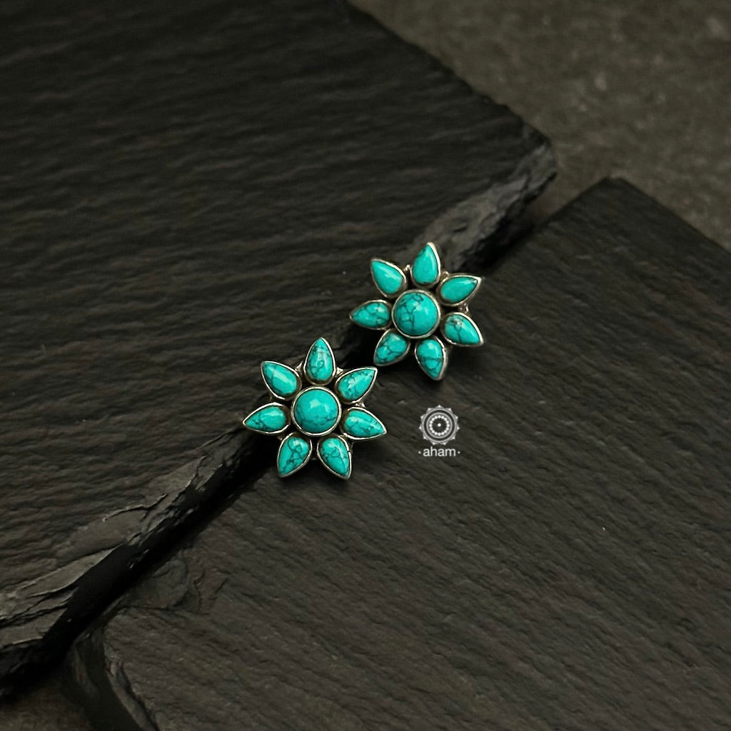 Crafted from 92.5 sterling silver and adorned with turquoise stones, these studs are designed to be lightweight and comfortable enough to wear throughout the entire day.