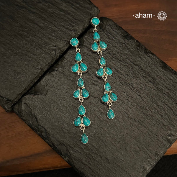 92.5 Sterling Silver Earring with amalgamated Turquoise Stones.
Light weight and easy to wear all day long.