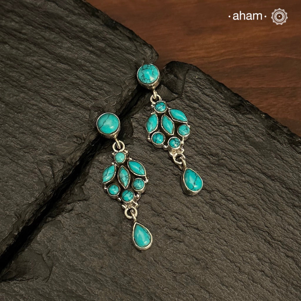 92.5 Sterling Silver Earring with Turquoise Stones.
Light weight and easy to wear. These make as great gifts as well.