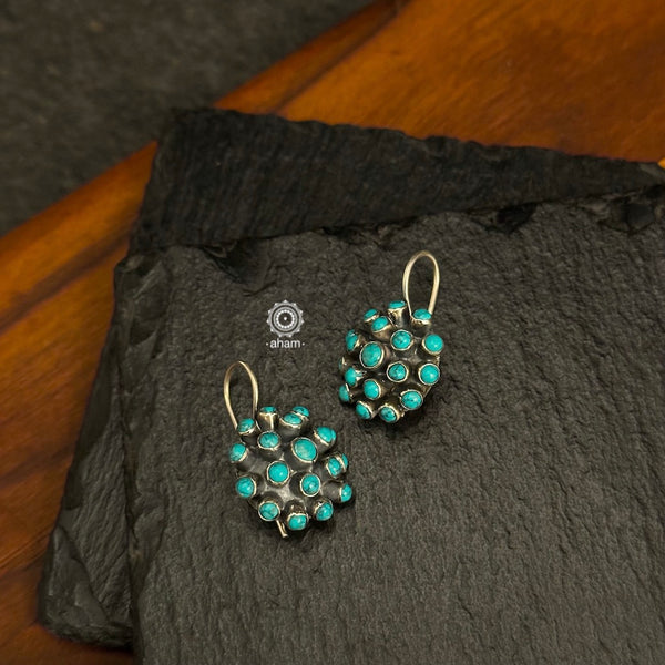 92.5 Sterling Silver Earrings with Turquoise coloured stones.
light weight and easy to wear