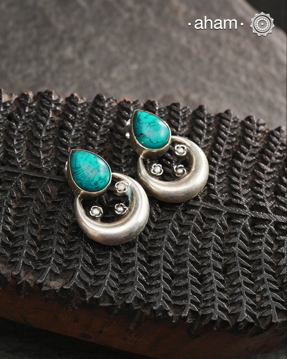 92.5 Sterling Silver Earring with turquoise stone drop.Light weight and easy to wear all day long.