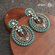 92.5 Sterling Silver Earrings with Turquoise Coloured stones. Beautiful craftsmanship and design.