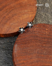 Beautiful silver studs with coloured stone highlights. Crafted in 92.5 silver, these are a great addition to your wardrobe.