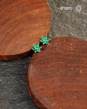 Beautiful silver studs with coloured stone highlights. Crafted in 92.5 silver, these are a great addition to your wardrobe.&nbsp;