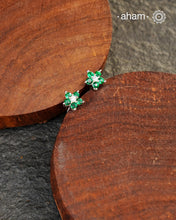 Beautiful silver studs with coloured stone highlights. Crafted in 92.5 silver, these are a great addition to your wardrobe.