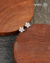 Beautiful silver studs with coloured stone highlights. Crafted in 92.5 silver, these are a great addition to your wardrobe.