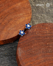 Beautiful silver studs with coloured stone highlights. Crafted in 92.5 silver, these are a great addition to your wardrobe.