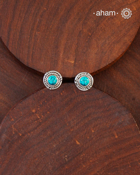 92.5 Sterling Silver Studs with Turquoise Stones.Light weight and easy to wear. These make great gifts as well.