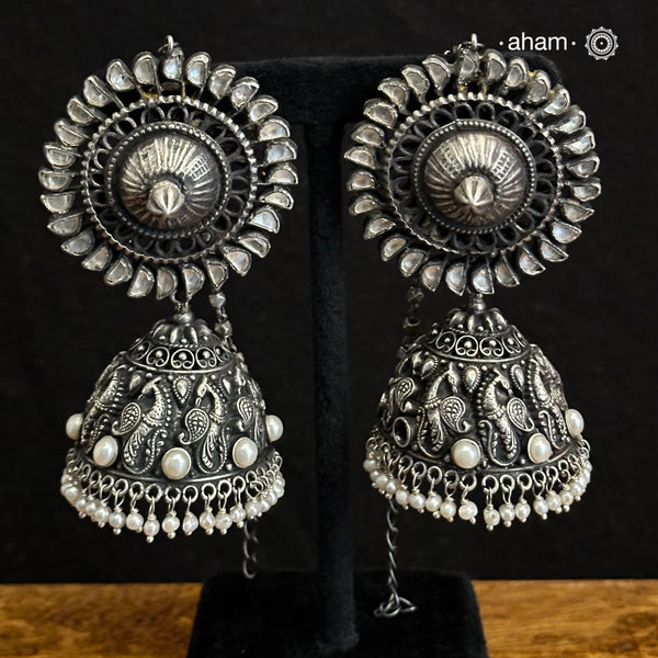 Statment jhumkie with kundan top and beautiful peacock Nakshi Jhumka base. Crafted in 92.5 silver.