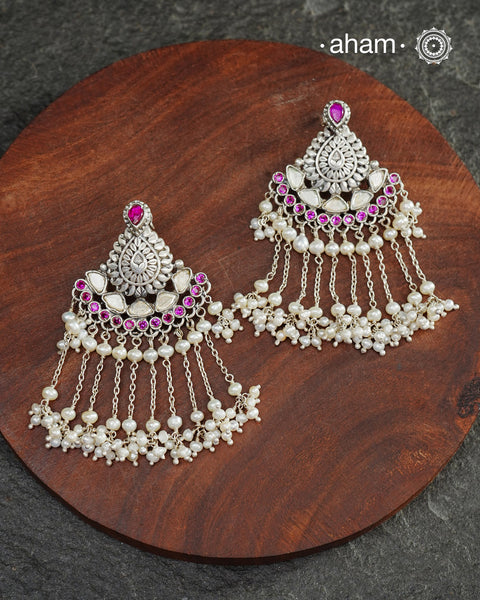 Make your special occasion even more special with these handcrafted 92.5 sterling silver danglers with intricate floral motifs and cultured pearls that will complete your look. Style this up with your favourite ethnic or fusion outfit