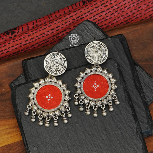 Handcrafted silver Rang Mahal drop earrings with elegant peacock stud and statement ghungroos. The magic that happens when glass, silver and a pop of colour come together.