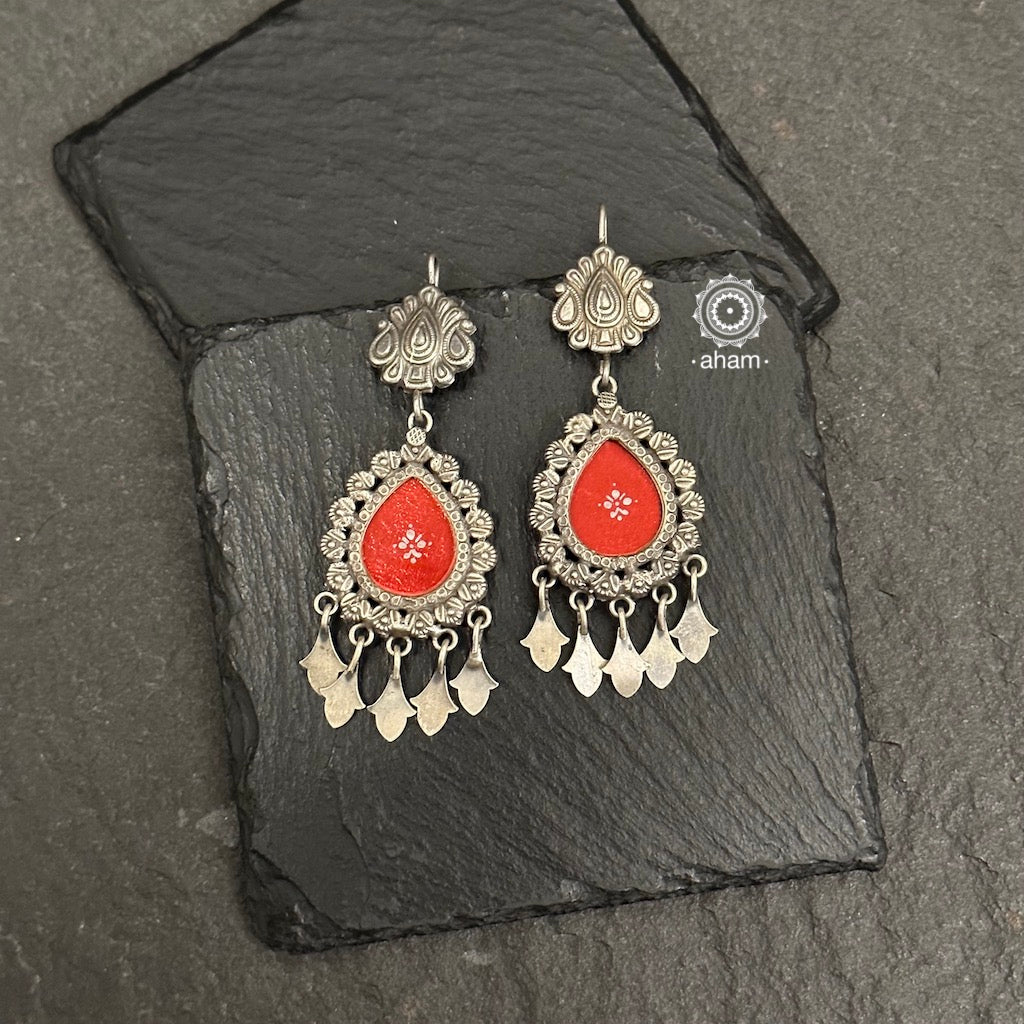 Handcrafted 92.5 sterling silver Rang Mahal drop earrings with elegant peacock stud and statement ghungroos. The magic that happens when glass, silver and a pop of colour come together.