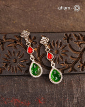 Handcrafted 92.5 sterling silver Rang Mahal green drop earrings. The magic that happens when glass, silver and a pop of colour come together.