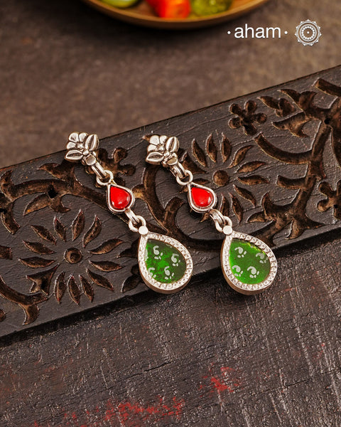 Handcrafted 92.5 sterling silver Rang Mahal green drop earrings. The magic that happens when glass, silver and a pop of colour come together.