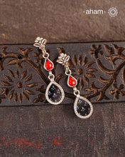 Handcrafted 92.5 sterling silver Rang Mahal black drop earrings. The magic that happens when glass, silver and a pop of colour come together.