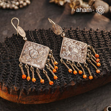 These silver earrings are sourced from the Turkmen central Asia regions.The dents, the marks, the irregularities all add to the charm and tell a story of where they comes from.