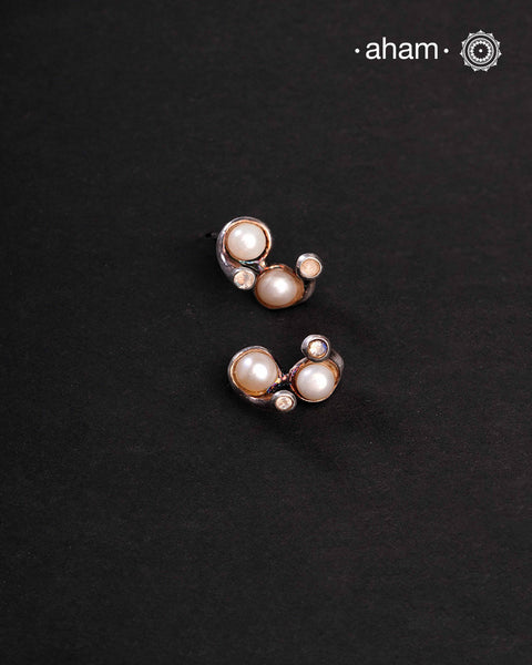 Contemporary light weight earrings in 92.5 silver. Minimalist work wear jewellery.Perfect wear from Dawn to Dusk.