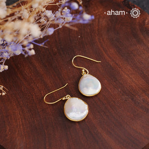 Shimmer and shine with these Mother of Pearl Gold Polish Silver Earrings! The natural mother of pearl is set in stylish silver with a touch of gold polish. The easy fishhook makes them light weight and a perfect go-to for any outfit. Dress them up or down, they'll be your new fave!


Keep in mind that these are natural forms, so both earrings in the set will have a similar shape, but not an exact match.