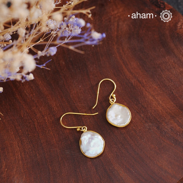 Shimmer and shine with these Mother of Pearl Gold Polish Silver Earrings! The natural mother of pearl is set in stylish silver with a touch of gold polish. The easy fishhook makes them light weight and a perfect go-to for any outfit. Dress them up or down, they'll be your new fave!


Keep in mind that these are natural forms, so both earrings in the set will have a similar shape, but not an exact match.