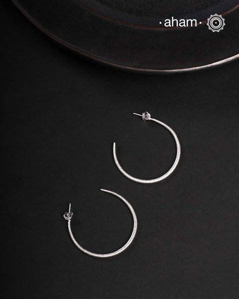 Contemporary light weight earrings in 92.5 silver. Minimalist work wear jewellery.Perfect wear from Dawn to Dusk.