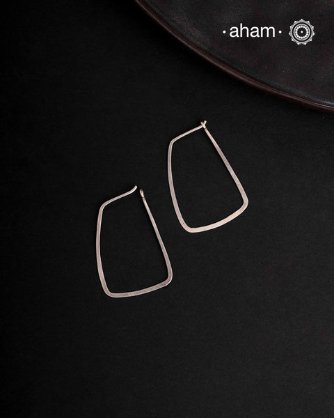Contemporary light weight earrings in 92.5 silver. Minimalist work wear jewellery.Perfect wear from Dawn to Dusk.