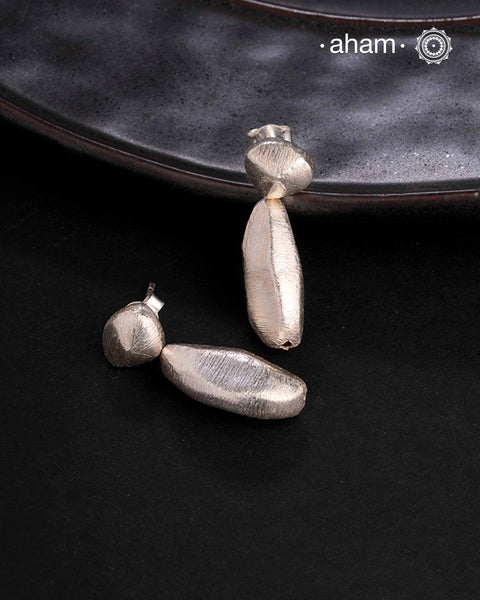 Contemporary light weight earrings in 92.5 silver. Minimalist work wear jewellery.Perfect wear from Dawn to Dusk.