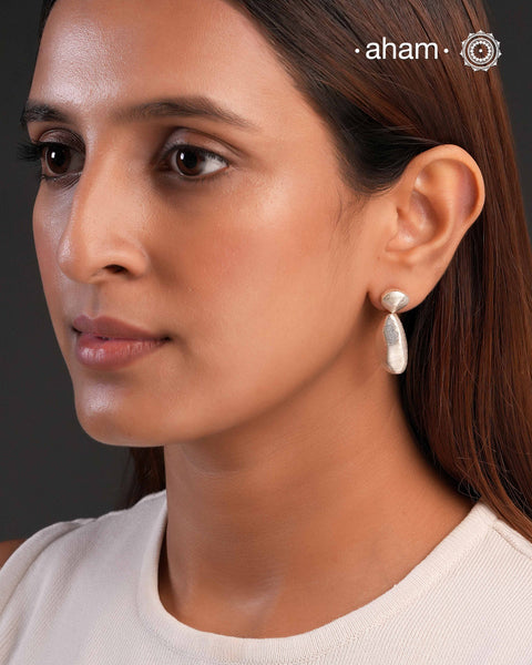 Contemporary light weight earrings in 92.5 silver. Minimalist work wear jewellery.Perfect wear from Dawn to Dusk.
