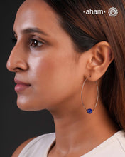 Contemporary light weight hoops in 92.5 silver with a lapiz drop for a hint of colour. Minimalist work wear jewellery. Perfect wear from Dawn to Dusk.