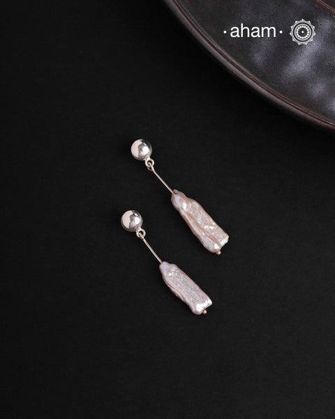 Contemporary light weight earrings in 92.5 silver. Minimalist work wear jewellery.Perfect wear from Dawn to Dusk.