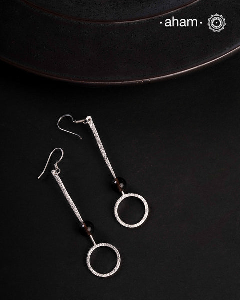 Contemporary light weight earrings in 92.5 silver. Minimalist work wear jewellery.Perfect wear from Dawn to Dusk.