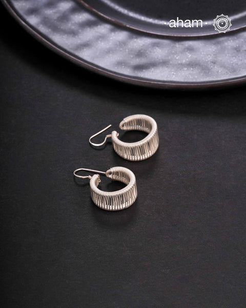 Contemporary light weight earrings in 92.5 silver. Minimalist work wear jewellery.Perfect wear from Dawn to Dusk