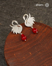 Contemporary earrings handcrafted in 92.5 sterling silver with intricate floral patterns.These earrings look elegant paired with any outfit from Dawn to Dusk.
