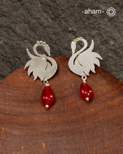 Contemporary earrings handcrafted in 92.5 sterling silver with intricate floral patterns.These earrings look elegant paired with any outfit from Dawn to Dusk.