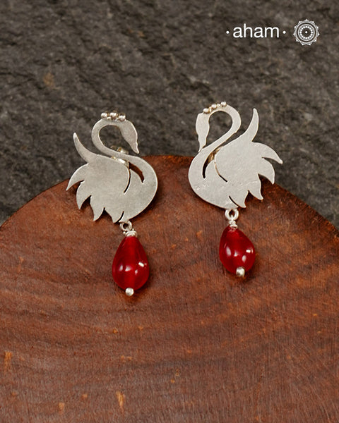 Contemporary earrings handcrafted in 92.5 sterling silver with intricate floral patterns.These earrings look elegant paired with any outfit from Dawn to Dusk.