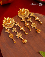 Handcrafted 92.5 Silver Earrings with antique Gold Polish Handcrafted with precision and timeless elegance in mind, these 92.5 silver earrings are carefully adorned with an antique gold polish. The result is a stunning and sophisticated piece of jewelry that will elevate any outfit, making you stand out with its unique charm