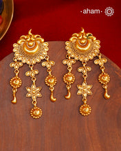 Handcrafted 92.5 Silver Earrings with antique Gold Polish Handcrafted with precision and timeless elegance in mind, these 92.5 silver earrings are carefully adorned with an antique gold polish. The result is a stunning and sophisticated piece of jewelry that will elevate any outfit, making you stand out with its unique charm