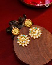 Classic silver gold polish earrings. perfect for festivities.
With beautiful turquoise Kundan work and Pearls