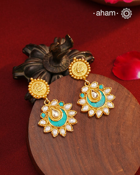 Handcrafted gold polish turquoise coloured crescent. Crafted using traditional techniques in 92.5 sterling silver with cultured pearls. Perfect for special occasionsand upcoming festive celebrations.