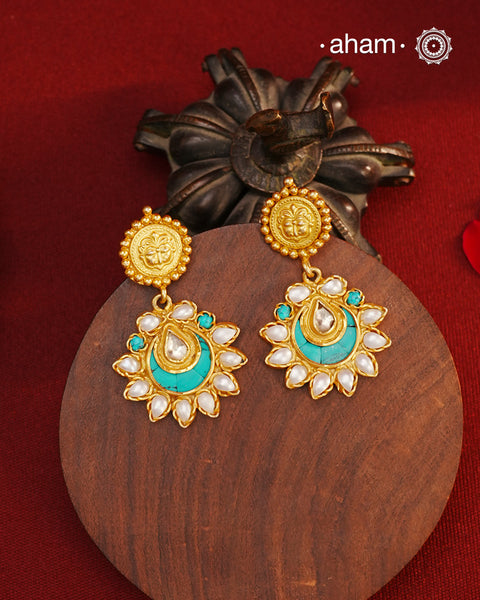 Handcrafted gold polish turquoise coloured crescent. Crafted using traditional techniques in 92.5 sterling silver with cultured pearls. Perfect for special occasionsand upcoming festive celebrations.