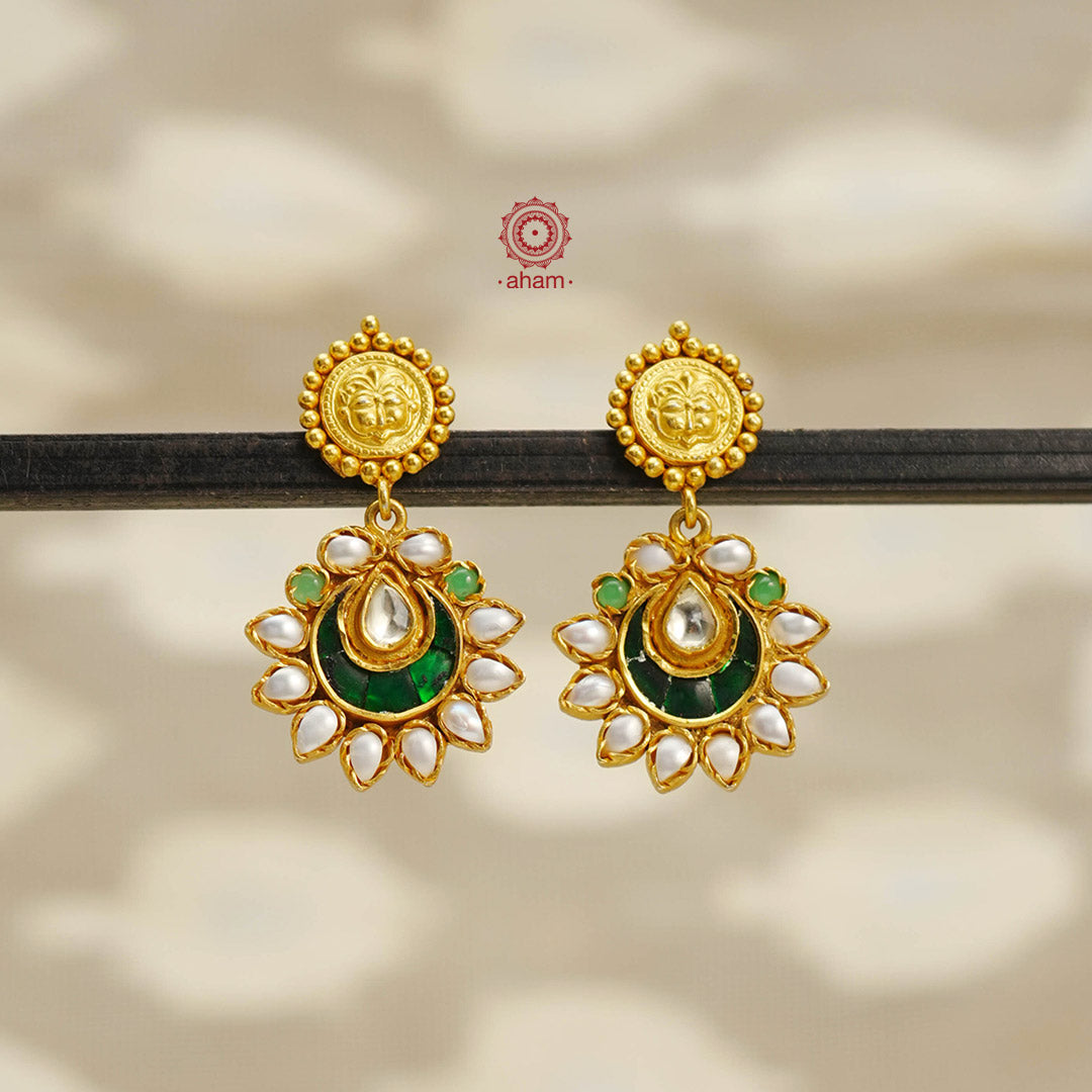 Handcrafted gold polish crescent earrings crafted using traditional techniques in 92.5 sterling silver with cultured pearls. Perfect for special occasions and upcoming festive celebrations. 
