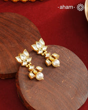 Stunning pair of Lotus Kundan earrings with pearl drop.  Perfect to wear at your friends engagement or for upcoming festivals. 