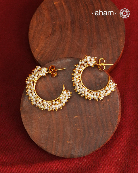 These Half Hoop Pearl Earrings are a must have in everyones wardrobe. 
So easy to pair with most outfits. Wear it with your Indian or contemporary wear.
Crafted in 925 silver with cultured fresh water pearls.