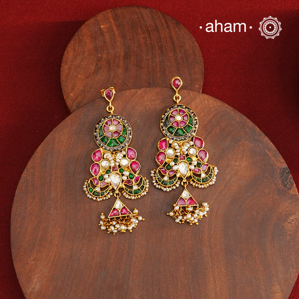 Fine Kundan Earrings with delicate work. Crafted in finest 92.5 silver with gold polish and pearls, these are heirloom earrings that can be passed on for generations to come.